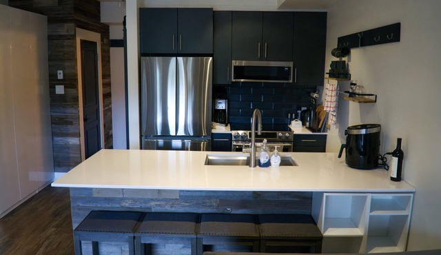 Modern, ground-level studio suite just steps from your mountain adventures. in Vernon