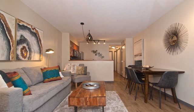 Modern quiet townhome with private HOT TUB, GAS fireplace, common Pool and hot tub.