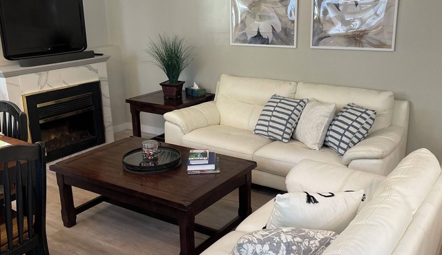 New 2 bedroom suite with private parking and entrance steps away from beach