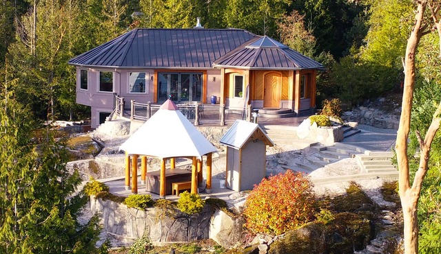 One of a kind custom home with exceptional views overlooking Strait of Georgia