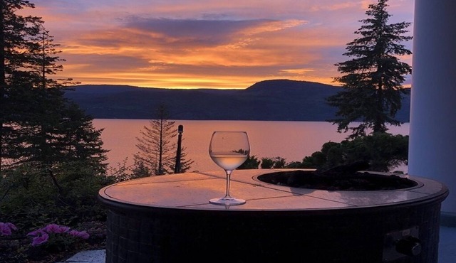 Semi-lake front on Shuswap lake with private beach dock and bouy.