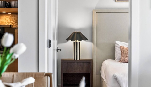 Welcome to Zara at Lakestone! A premier lakeside community for a peaceful escape with pickleball courts, gym, & sauna. Relax in a stylish condo retreat at Zara Lakestone. Features: private patio w/BBQ & workspace.