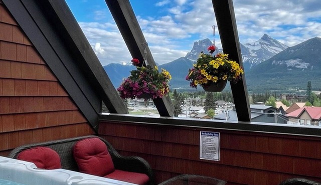 Your Penthouse with a private rooftop new hot tub.