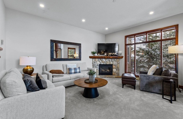 Magnificent multi level 3 bedroom + den townhouse, close to Morrisey lift