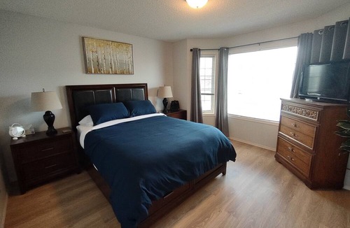 Grande Prairie House | Cheerful 3 Bedroom Home - Fully Stocked, Clean & Pet Friendly!