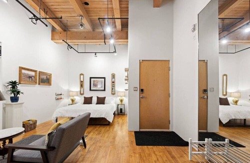 Downtown Edmonton Apartment | Historic Art Loft | Walk to Rogers | Free Parking