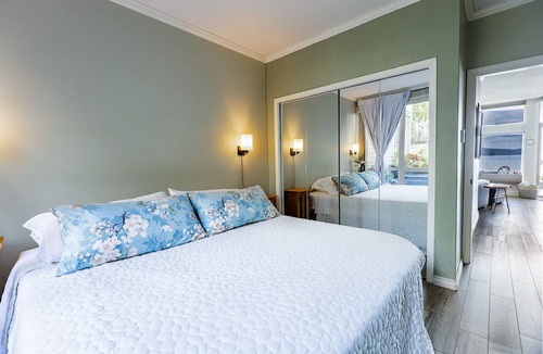 North Oyster Condo | Beach Bliss oceanfront king suite! Stunning view, patio, dock, pool & hot tub!