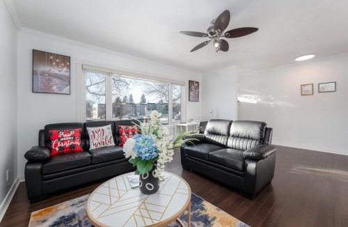 Southeast Calgary Villa | Executive family Relax House New AC 4Bed rooms 4Queen Beds plus Kids play rooms Large Deck Private Backyard 19 minutes YYC Walk to C Train Free BANFF PARK PASS
