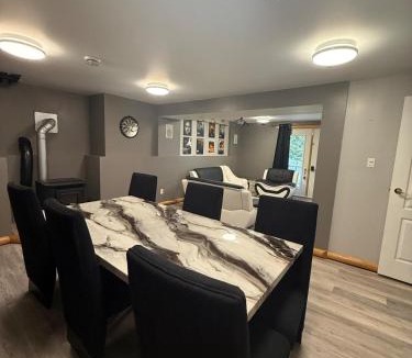 Hinton Apartment | Modern Upper Basement Theatre Suite of Hinton!