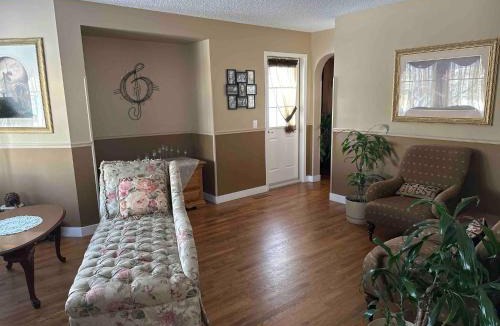 Okotoks House | Charming Victorian Home in Okotoks Elegant Comfort Modern Convenience