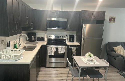 Southeast Calgary Apartment | Cozy Family Suite - Avail for Long Stay
