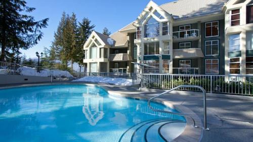 Upper Village House | Woodrun Lodge 616 | Stylish Top Floor Ski-In & Out Condo by Upper Village w/Hot Tub, Pool, Parking