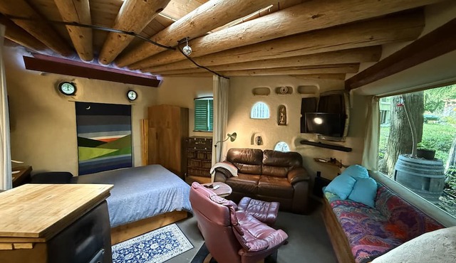 The Wobbly Hobbit- a unique cob studio in the forest.