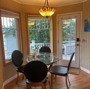 Charming Victorian Home in Okotoks Elegant Comfort Modern Convenience